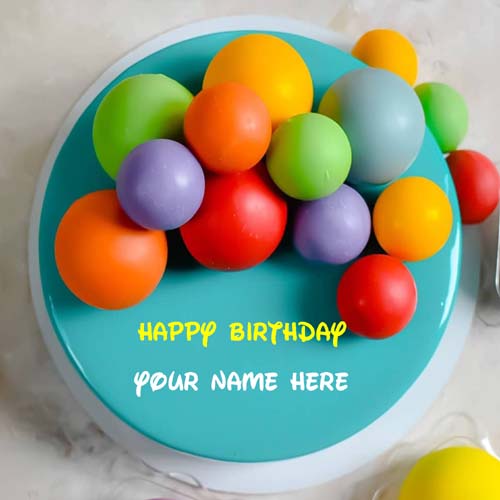 Colorful Ball On Happy Birthday Cake With Name