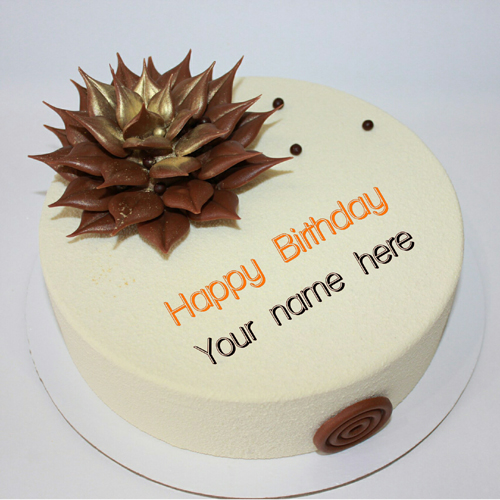 Write Name On Vanilla Cake With Chocolate Flower On It
